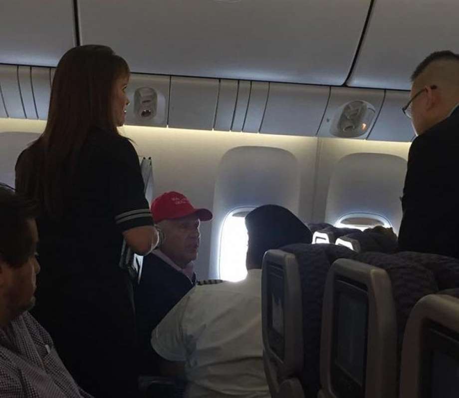Man in Trump hat kicked off a flight as a crowd chanted: "˜Lock him up!"™